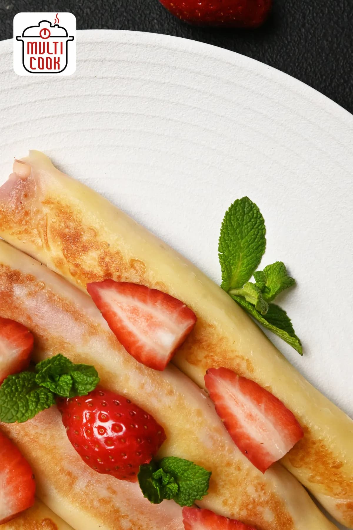 Cheese and strawberry crepes